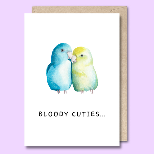 Greeting card with two watercolour style love birds on the front. The text says “bloody cuties”