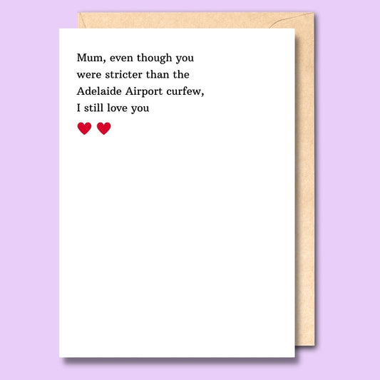 A plain white card that says "Mum, even though you were stricter than the Adelaide Airport curfew, I still love you" on the front.