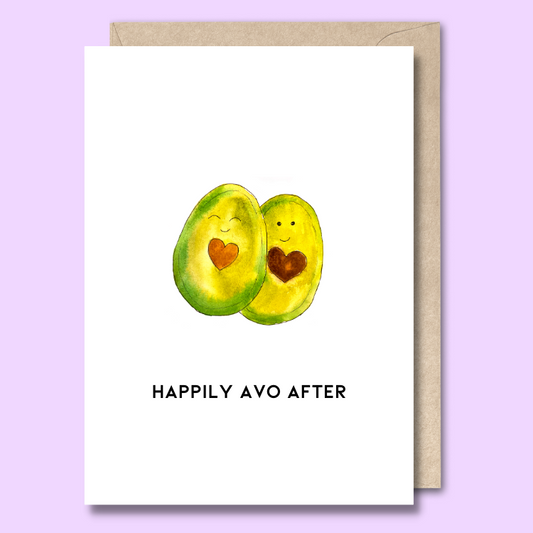 Greeting card with a watercolour style picture of two avocados on the front. The text says “Happily avo after”