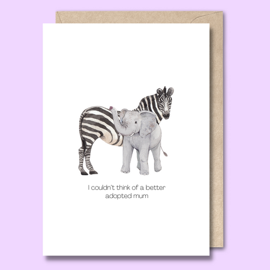 Front of a plain white greeting card with a baby elephant in front of a zebra. The text says "I couldn't think of a better adopted mum"