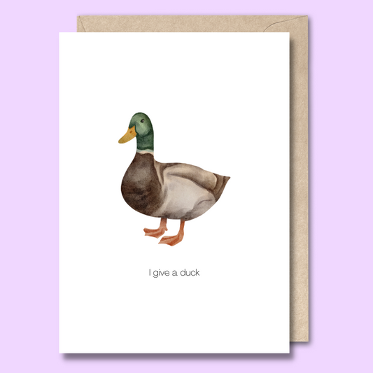 Greeting card with a watercolour style duck on the front. The text says “I give a duck”