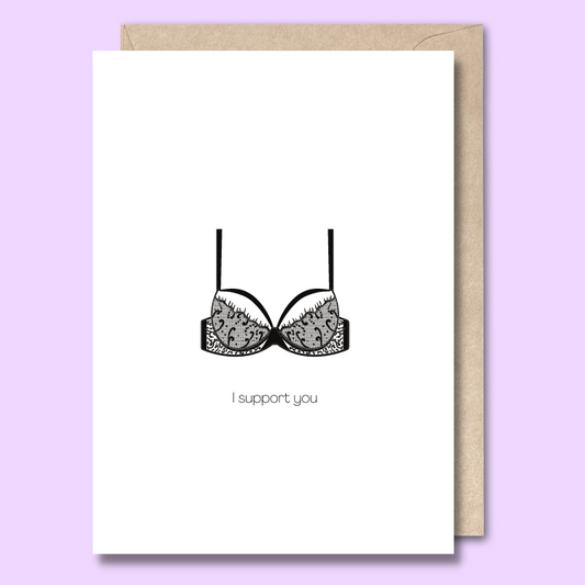 Front of a plain white greeting card with a black and white image of a lacey bra in the middle. The text says "I support you"