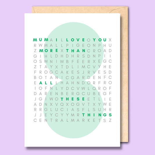 A white card with a word search on the front. The words "Mum, I love you more than all these things" are written in green text to stand out.