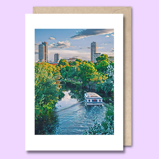 Greeting card with a stylised photo of the Popeye boat travelling down a leafy River Torrens on the front. 