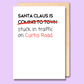 Card with text 'Santa Claus is stuck in traffic on Curtis Road' on a purple background