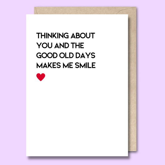 Front of a plain white greeting card with plain text saying "Thinking about you and the good old days makes me smile."