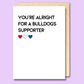 White greeting card that says 'You're alright for a Bulldogs supporter' on the front.