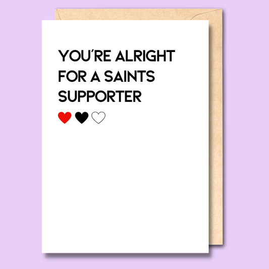 A white greeting card that says 'You're alright for a Saints supporter'