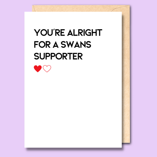 A white greeting card that says 'You're alright for a Swans supporter'