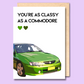 A white card on a purple background. The card has a picture of a lime green Holden Commodore on it. The text says "You're as classy as a Commodore."