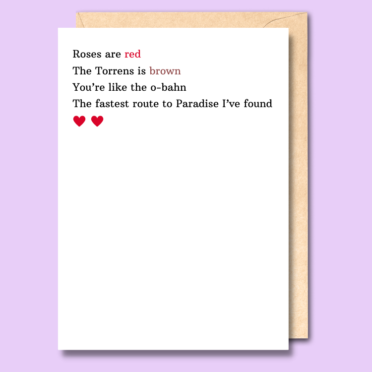 A white greeting card with plain text on the front saying "Roses are red, the Torrens is brown, you're like the o-bahn, the fastest route to Paradise I've found"