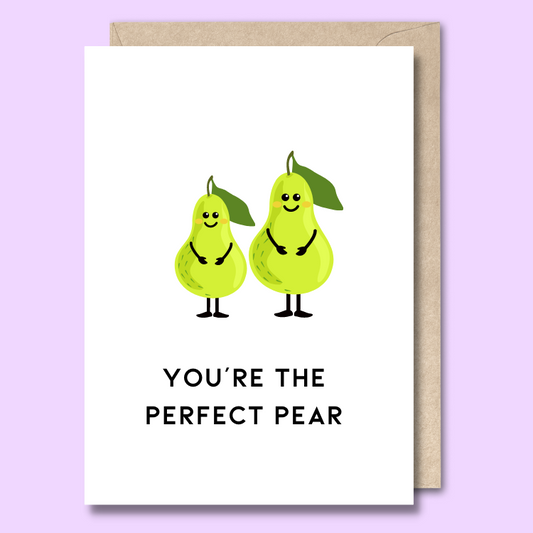 Greeting card with images of two green pears on the front. The text says “You’re the perfect pair”