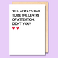 A white greeting card that says 'You always had to be the centre of attention, didn’t you?'