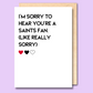 A white greeting card that says 'I'm sorry to hear you're a Saints fan (like really sorry)